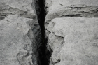 Sheshymore Limestone with classic kharstified exposures of the disolving fracture margins, Grikes, of tabular blocks of limestone pavement, Clints. Widened driven by post glacial disolution (McNamara, & Hennessy, 2010). Variscan folding initiated the fractures (Coller, 1984).